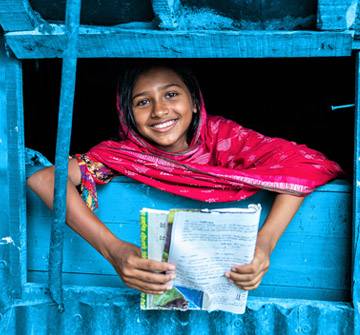 Somos lo que hacemos Niña sonriendo
