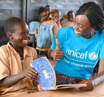 Quiénes somos Un niño sonriendo