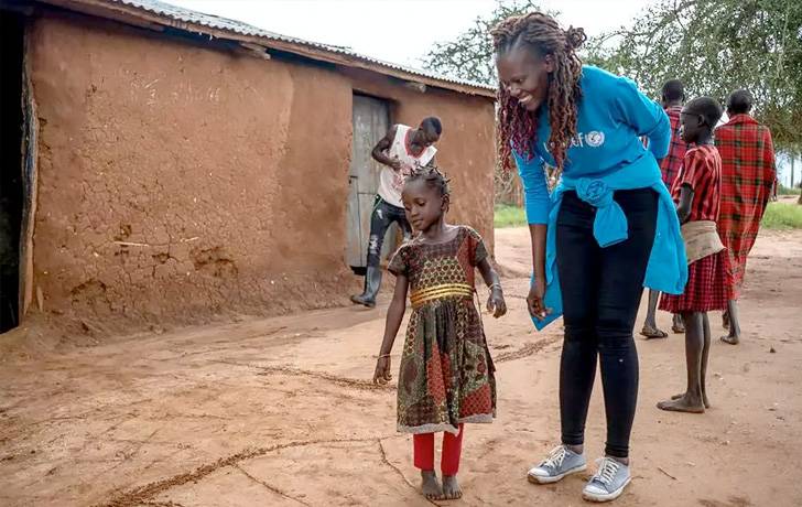 Somos una organización apolítica e imparcial Niña sonriendo